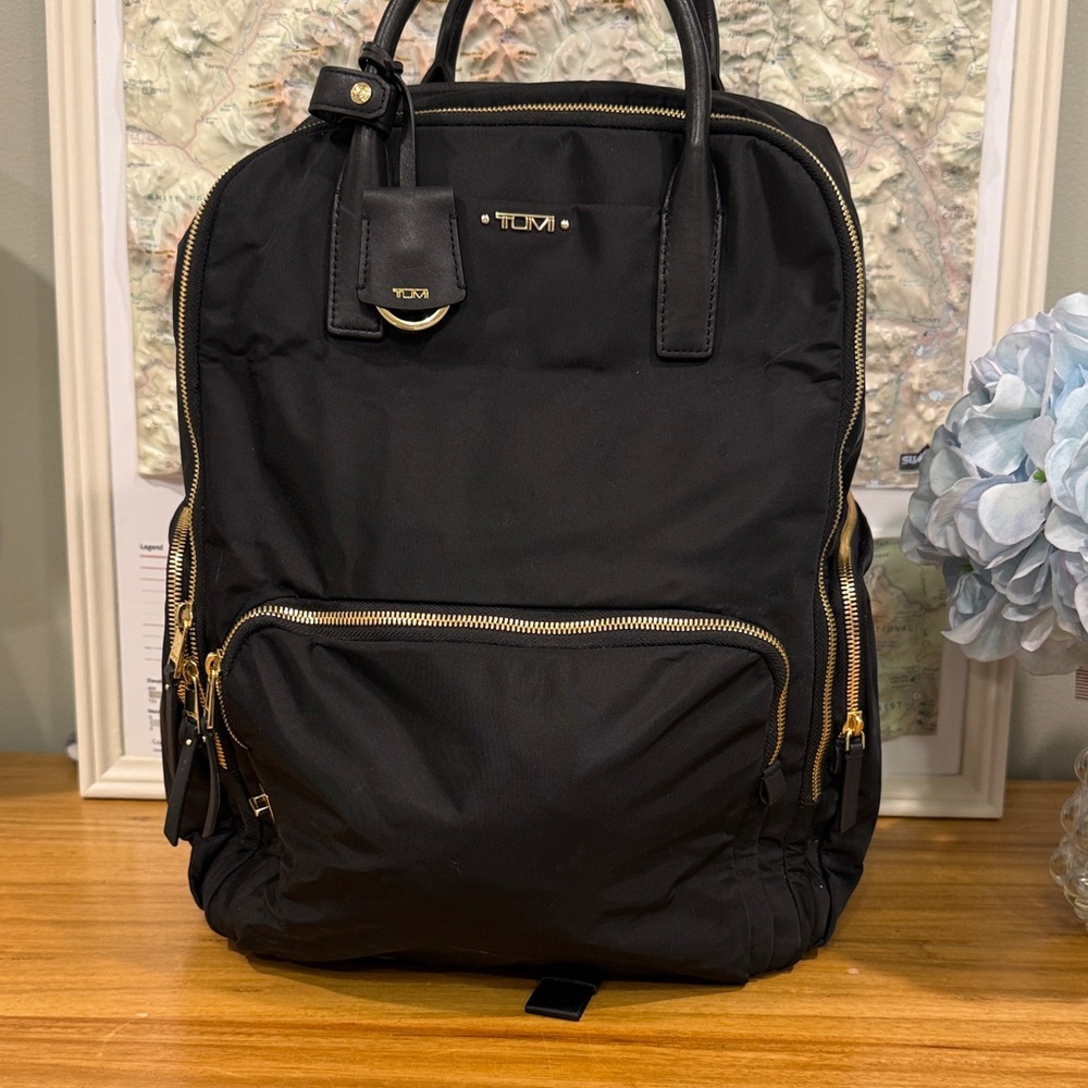 Tumi Black and Gold Women’s Backpack